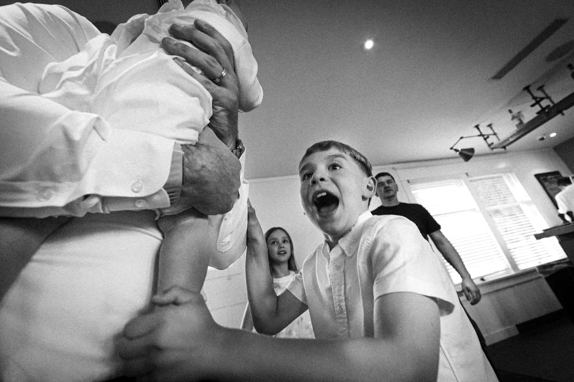 Guests cheering during the wedding celebration